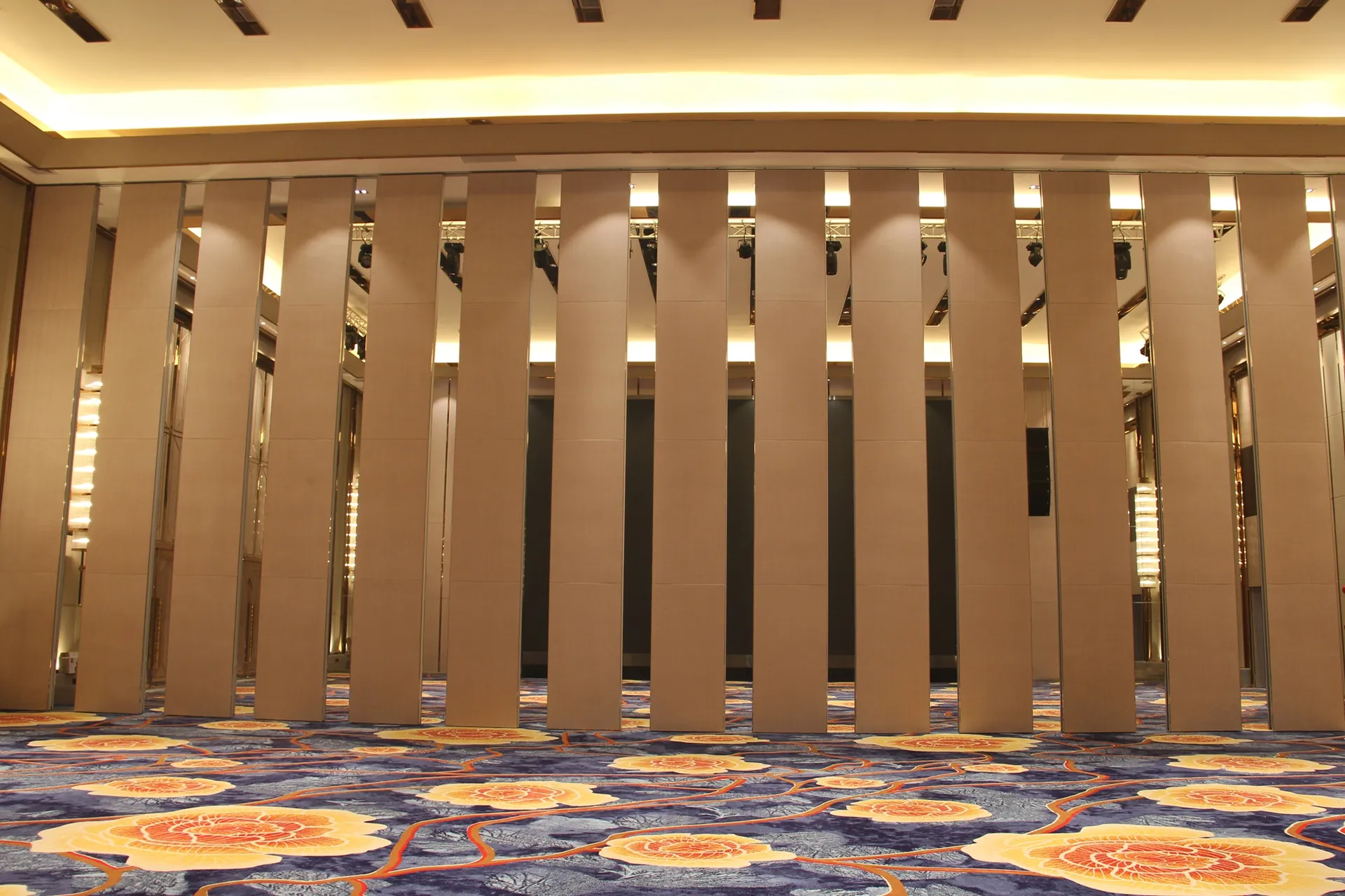 Ultra-high operable partition walls in an atrium