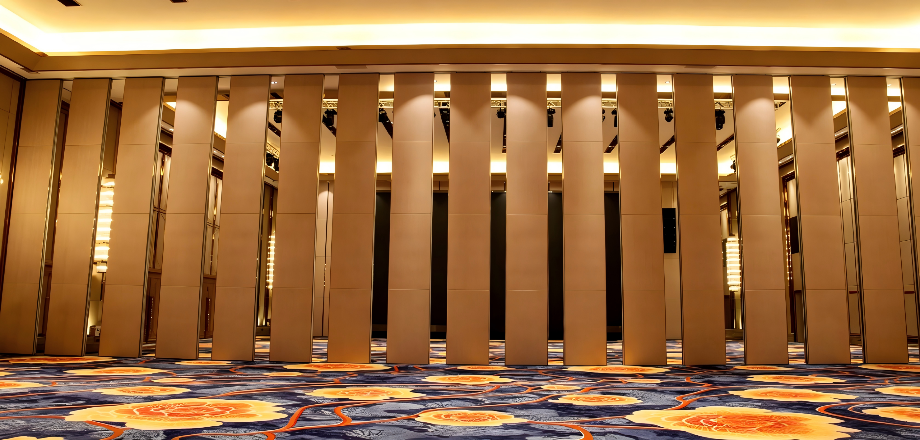 Ultra-high operable partition panels closing a hotel ballroom