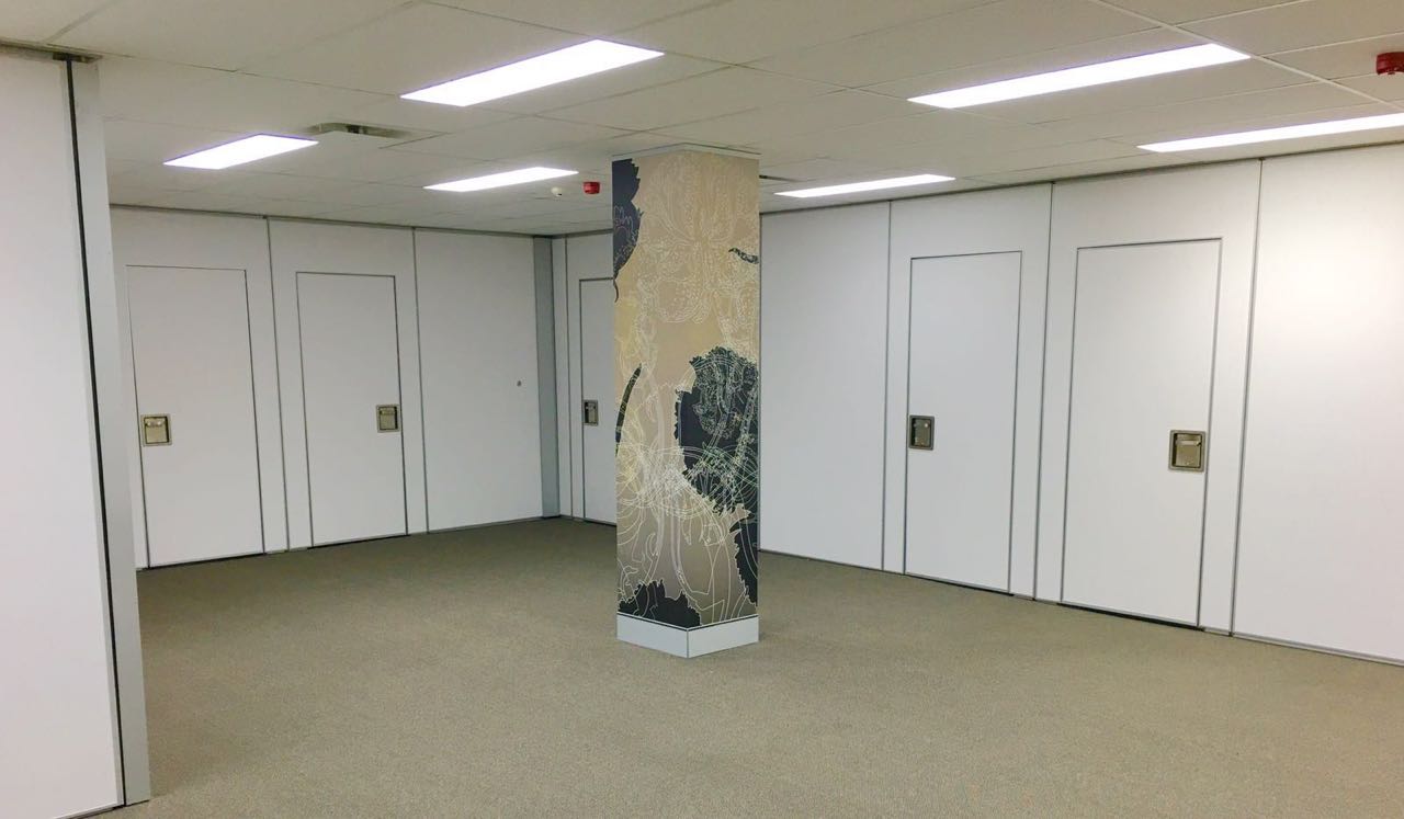 Vinyl-Face Operable Partition Wall with Pass-Door — In Production